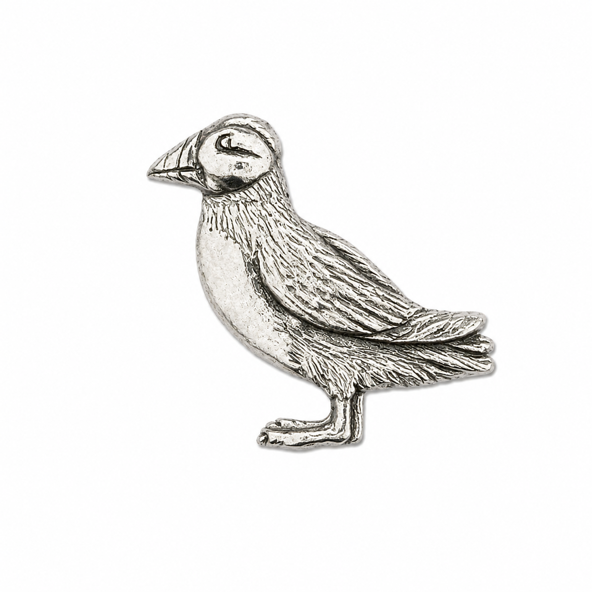 Handcrafted pewter puffin pin badge with detailed beak, wings and feather design