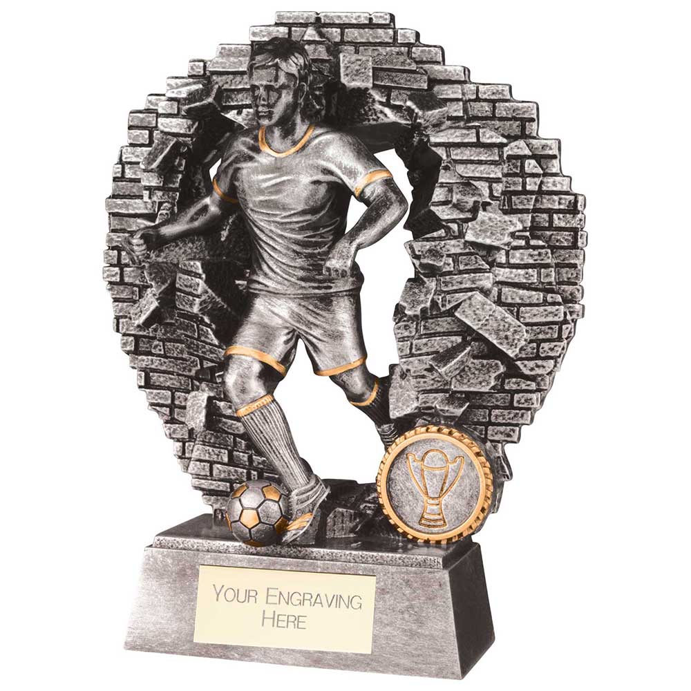 Blast Out Male resin football trophy featuring a footballer breaking through a brick wall with personalised engraving plate