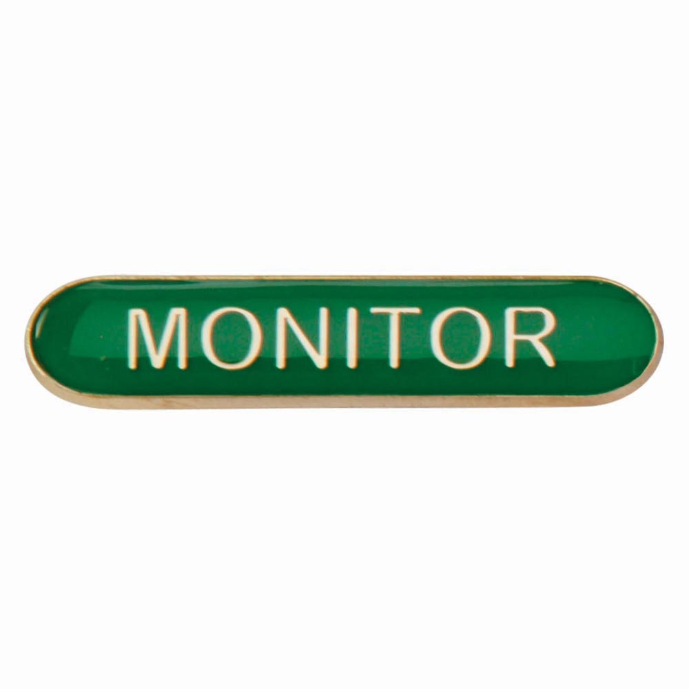 Monitor school bar badge in green enamel with gold lettering and butterfly clutch fastening.