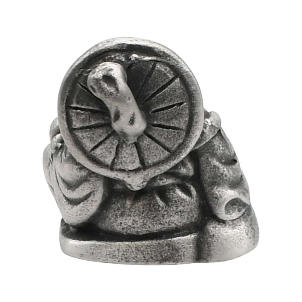 English-made pewter Buddha ornament, rear view showing a round decorative detail and sculpted robes