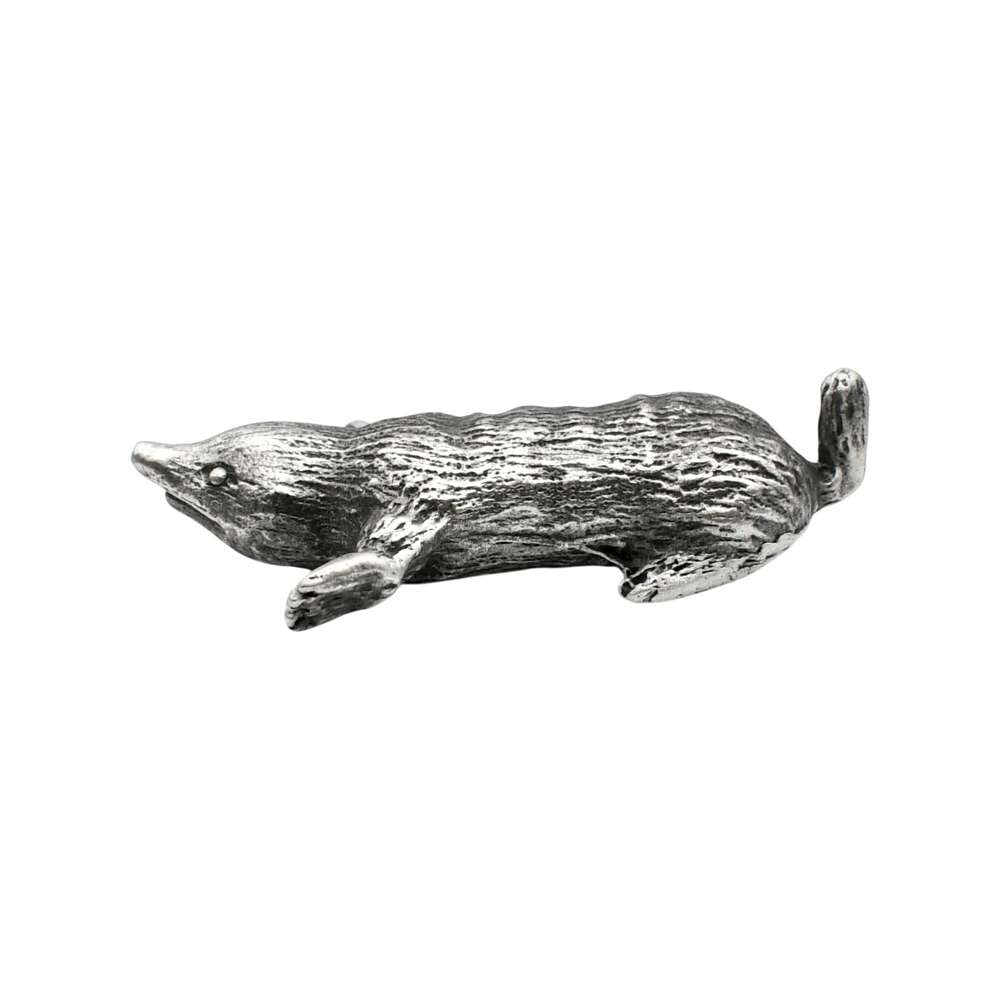 Side view of English-made pewter mole figurine showing its elongated body, digging paws and short tail