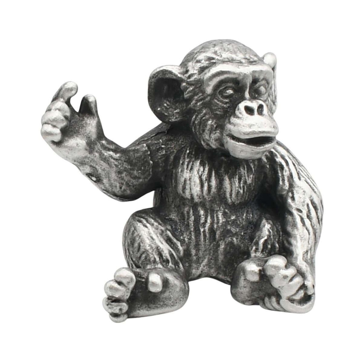 English made pewter seated chimpanzee figurine ornament with raised hand, front view XCSORN094