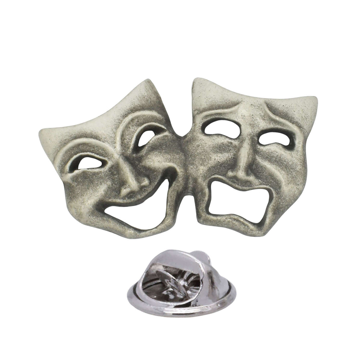 Antique silver-coloured comedy and tragedy theatre masks lapel pin badge with smiling and sad faces and butterfly clasp