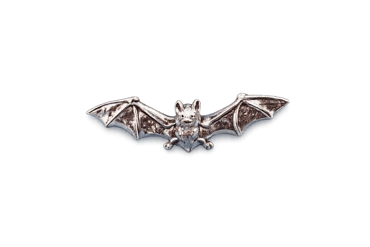 Detailed pewter bat pin badge with outstretched wings and butterfly clutch fastening on a white background.
