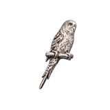 Handcrafted pewter budgerigar pin badge featuring a budgie perched on a branch.