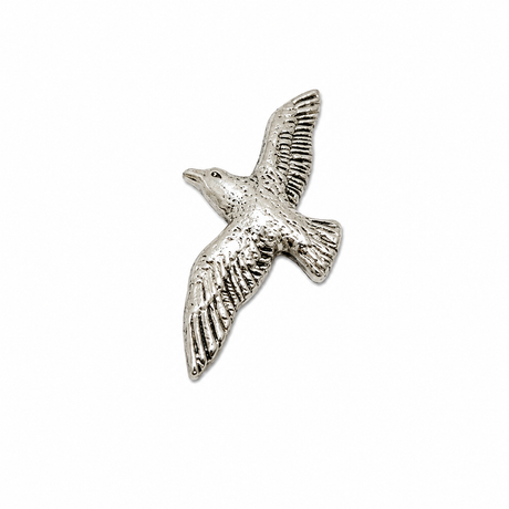 Handcrafted pewter Flying Seagull pin badge featuring a British coastal seabird in flight.