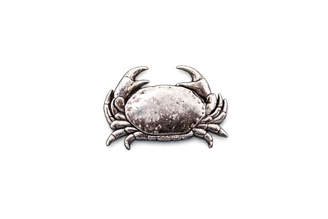 Handcrafted pewter crab pin badge featuring a detailed coastal marine design with butterfly clutch fastening on a white background.