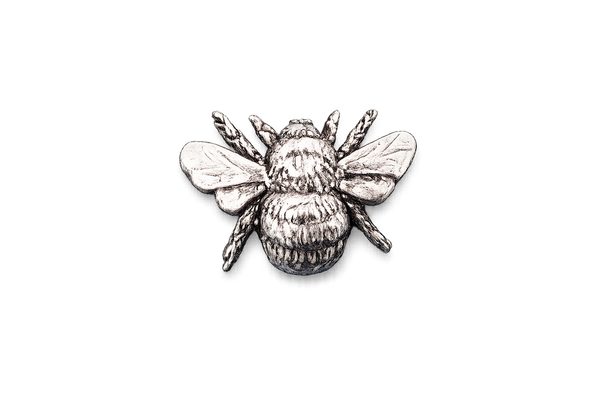 Detailed pewter Bee pin badge with textured body and sculpted wings on a white background.