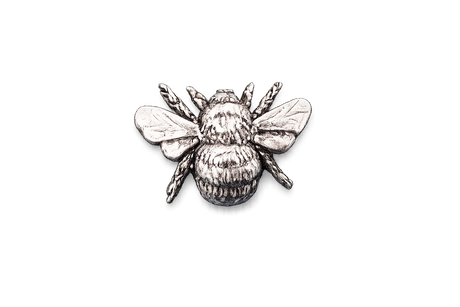 Detailed pewter Bee pin badge with textured body and sculpted wings on a white background.