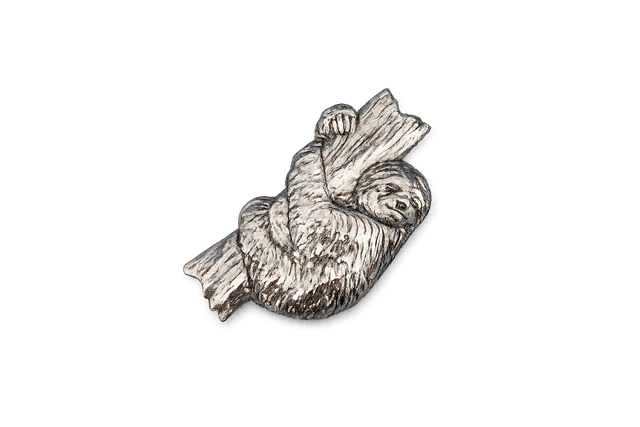 Detailed pewter Sloth pin badge featuring a sloth hugging a tree branch with butterfly clutch fastening on a white background.