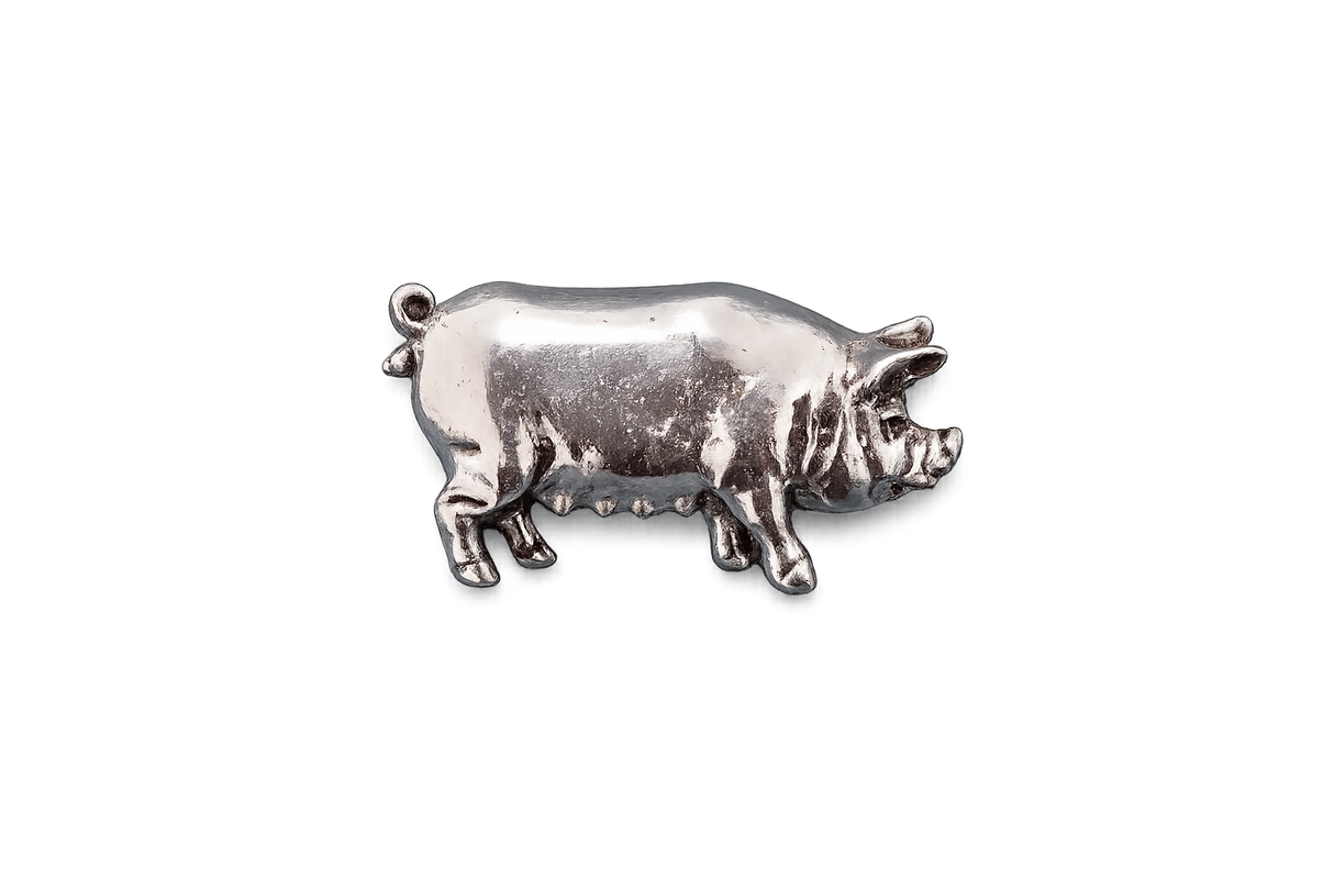 Detailed pewter pig pin badge with butterfly clutch fastening on a white background.