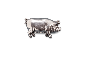 Detailed pewter pig pin badge with butterfly clutch fastening on a white background.