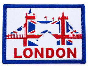 London embroidered patch featuring Tower Bridge with a Union Jack design, blue stitched border, suitable for iron-on or sew-on application.