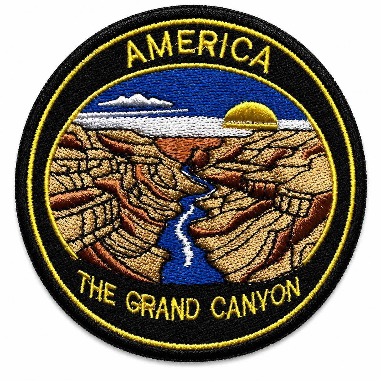 Round embroidered patch featuring the Grand Canyon in America with a canyon landscape, river and sunset, black and gold stitched border, suitable for iron-on or sew-on application.