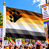 Gay Bear Pride Flag 5ft x 3ft with black paw print flying on a flagpole at a colourful Pride rally