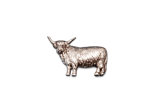 Handcrafted pewter Highland Cow pin badge featuring a detailed Scottish cattle design with butterfly clutch fastening on a white background.