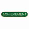 Achievement school bar badge in green with gold lettering and butterfly clutch fastening.