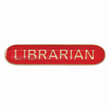 Librarian school bar badge in red enamel with gold lettering and butterfly clutch fastening.
