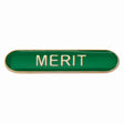 Merit school bar badge in green enamel with gold lettering and butterfly clutch fastening.
