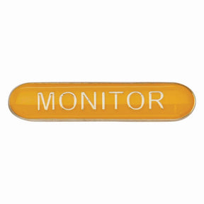 Monitor school bar badge in yellow enamel with gold lettering and butterfly clutch fastening.