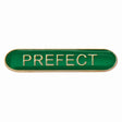 Prefect school bar badge in green enamel with gold lettering and butterfly clutch fastening.