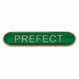 Prefect school bar badge in green enamel with gold lettering and butterfly clutch fastening.