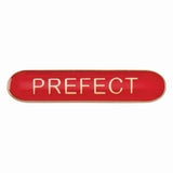 Prefect school bar badge in red enamel with gold lettering and butterfly clutch fastening.
