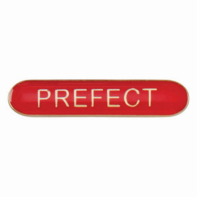 Prefect school bar badge in red enamel with gold lettering and butterfly clutch fastening.