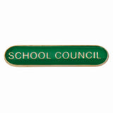 School council bar badge in green enamel with gold lettering and butterfly clutch fastening.