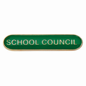School council bar badge in green enamel with gold lettering and butterfly clutch fastening.