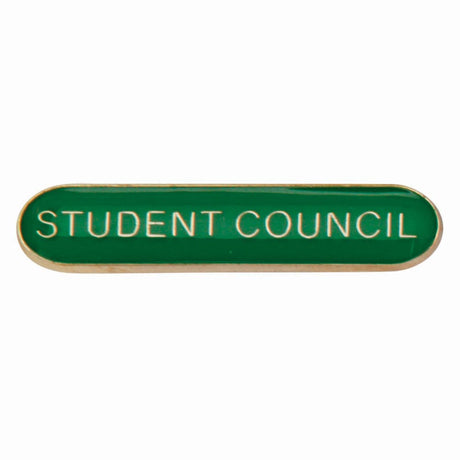 School student council bar badge in green enamel with gold lettering and butterfly clutch fastening.