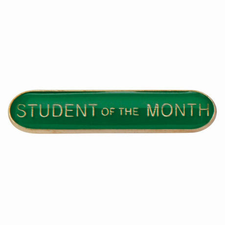 School student of the month bar badge in green enamel with gold lettering and butterfly clutch fastening.