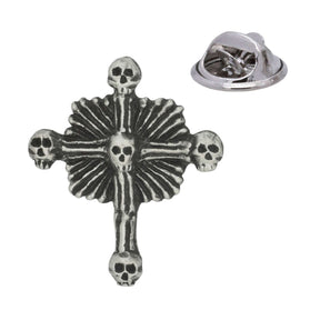 Antique silver pewter skull and bones cross lapel pin with five skulls; rear pin fastening shown