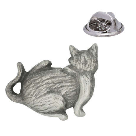 Antique silver pewter seated tabby cat lapel pin badge with curled tail, showing rear clasp