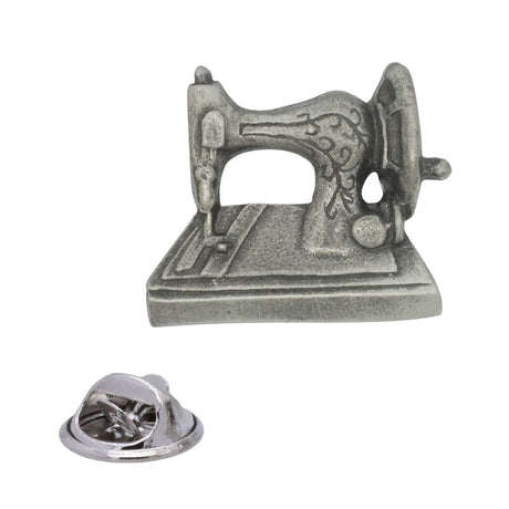 Antique silver vintage sewing machine pewter lapel pin badge with floral decoration, handwheel and rear butterfly clasp