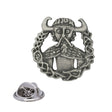 Antique silver Loki Norse mythology pewter lapel pin showing horned figure, decorative knotwork border and butterfly clasp