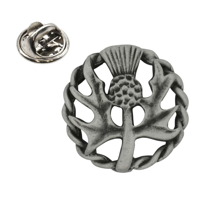 Antique silver Scottish thistle pewter lapel pin with textured thistle and Celtic circular woven border, clasp shown