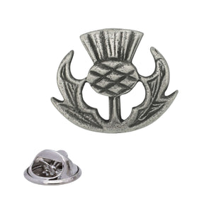 Antique silver Scottish thistle pewter lapel pin with cross-hatched flower head, curved spiky leaves and rear butterfly clasp