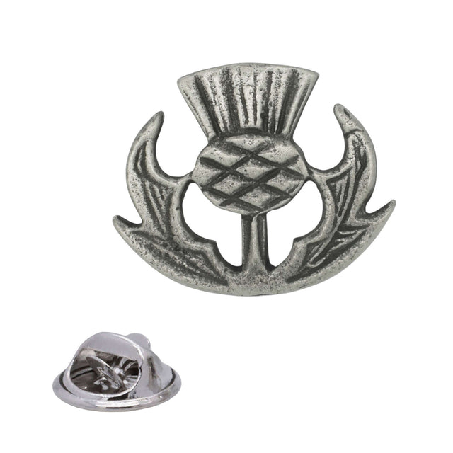 Antique silver Scottish thistle pewter lapel pin with cross-hatched flower head, curved spiky leaves and rear butterfly clasp