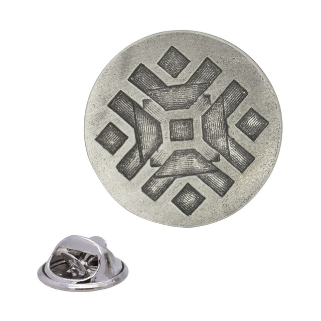 Antique silver circular Universe pewter lapel pin with symmetrical textured geometric motif and rear butterfly clasp