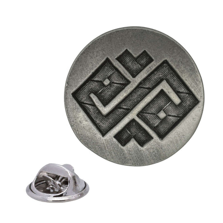 Antique silver round Wisdom pewter lapel pin with angular geometric design and rear butterfly clasp