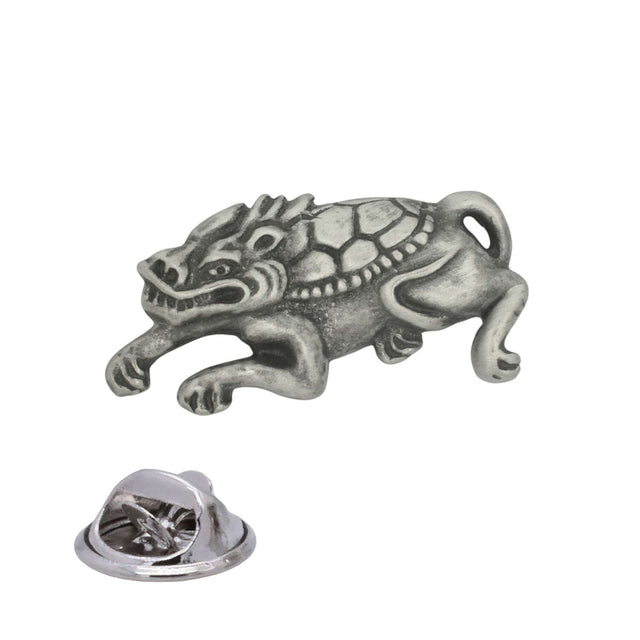 Antique silver Japanese Oni pewter lapel pin badge showing mythical creature with expressive face, textured back, curled tail and rear clasp
