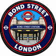 Round 80mm embroidered patch showing a stylised Bond Street station entrance beneath an Underground roundel, finished with a black border.