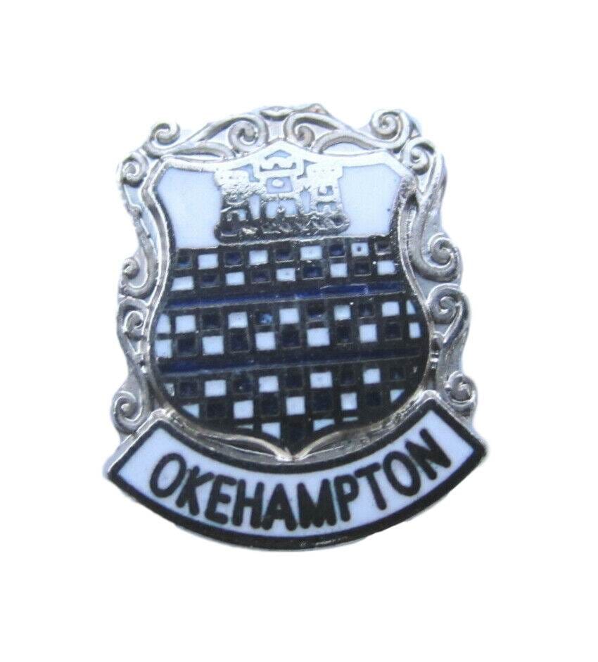 Okehampton Quality Enamel Lapel Pin Badge image 0