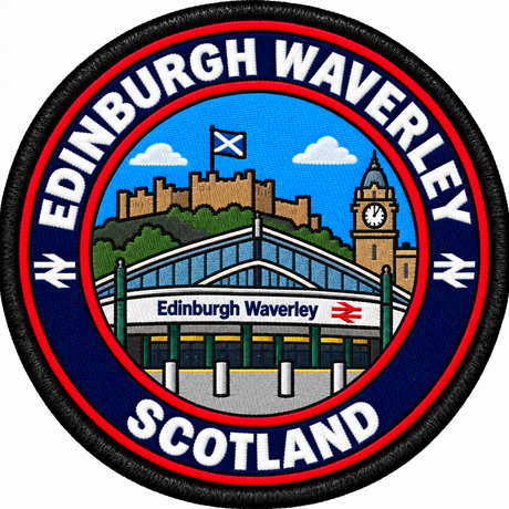 Round 80mm embroidered patch showing a stylised Edinburgh Waverley station entrance, with a castle, Saltire and clock tower behind, finished with a black border.