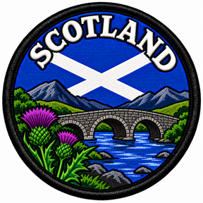 Round 80mm Scotland embroidered patch showing a three-arch stone bridge over blue water with mountains and purple thistles, with a Saltire and SCOTLAND lettering, finished with a black border.