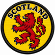 Round 80mm Scotland embroidered patch showing a red lion rampant with blue claws and tongue on yellow, with black SCOTLAND lettering, finished with a black border.