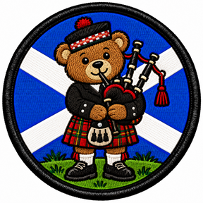 Round 80mm embroidered patch showing a teddy bear playing bagpipes in a red tartan kilt against a blue and white Saltire, framed by a black border.