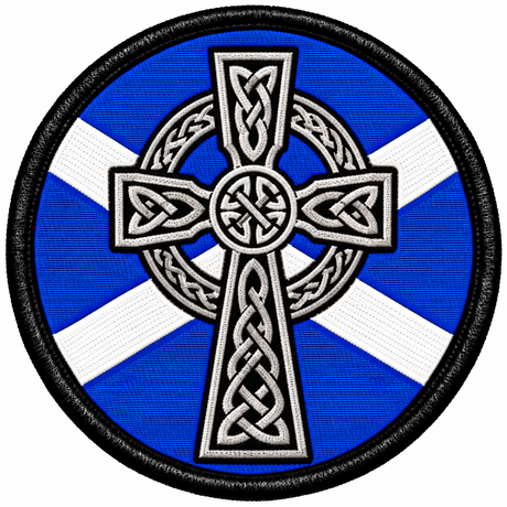 Round 80mm embroidered patch showing a white and black Celtic cross with knotwork over a blue and white Saltire, framed by a black border.