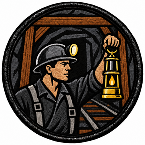 Round 80mm embroidered patch showing a helmeted coal miner holding a glowing lantern inside a timber-supported mine tunnel, framed by a black border.